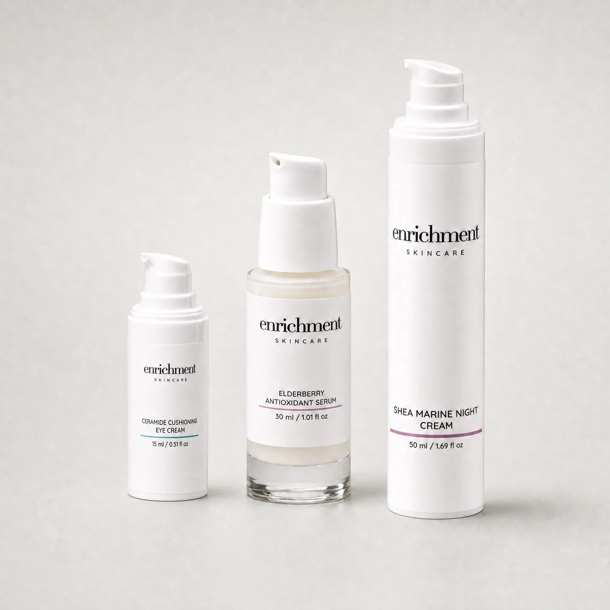 Ceramide Cushioning Eye Cream, Elderberry Antioxidant Serum and Shea Marine Night Cream standing together in a row, smallest to tallest