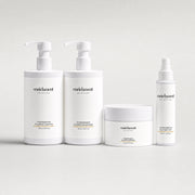 Four Enrichment Skincare hair products in a row: Hydrokeratin Plumping Shampoo, Hydrokeratin Plumping Conditioner, Hydrokeratin Plumping Hair Mask and Hydrokeratin Silk Hair Mist