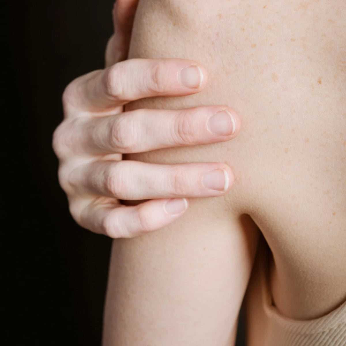Woman's shoulder and upper back, deodorant application area