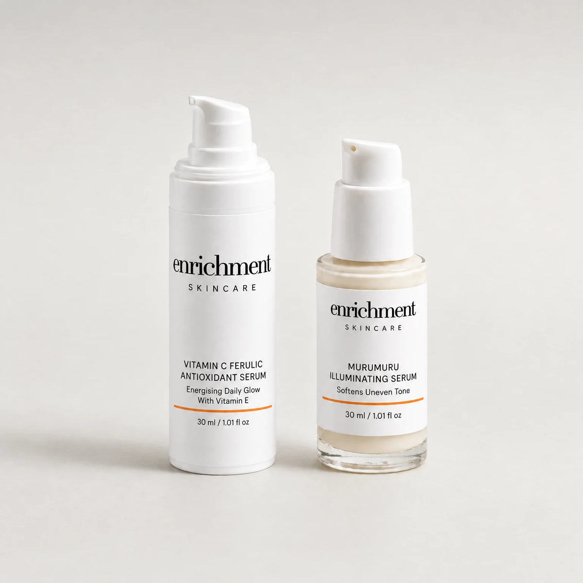 The Vitamin C Ferulic Antioxidant Serum and the Murumuru Illuminating Serum standing side by side