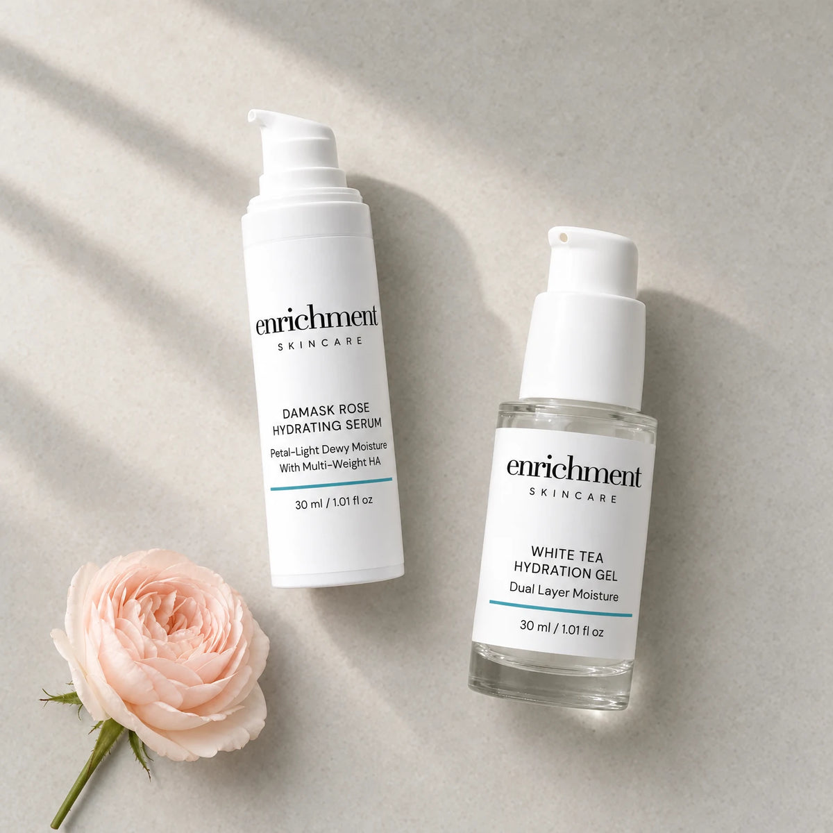 The two Duo products laid out in usage order, serum then gel, with a single pale damask rose