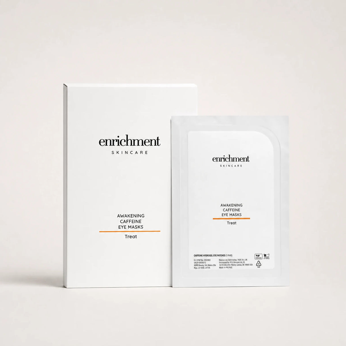 Enrichment Awakening Caffeine Eye Masks carton with one sachet on a soft grey studio background