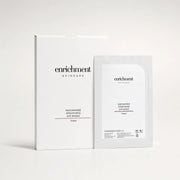 Enrichment Niacinamide Smoothing Eye Masks carton with one sachet on a soft grey studio background