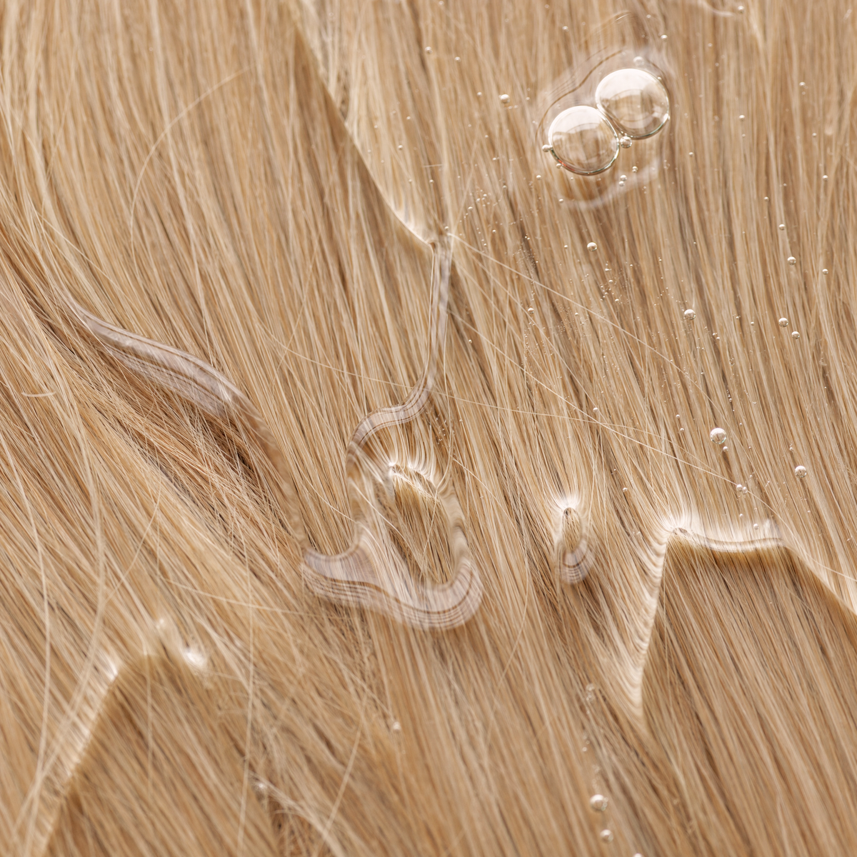 Shampoo on wet hair close-up
